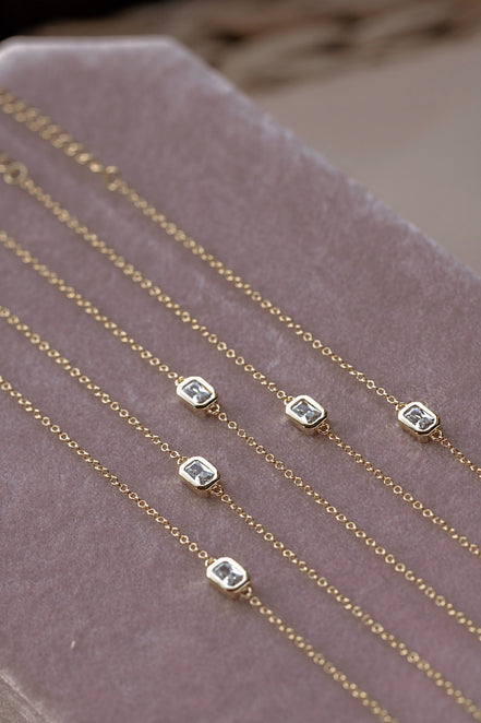 White Topaz Emerald Bracelet