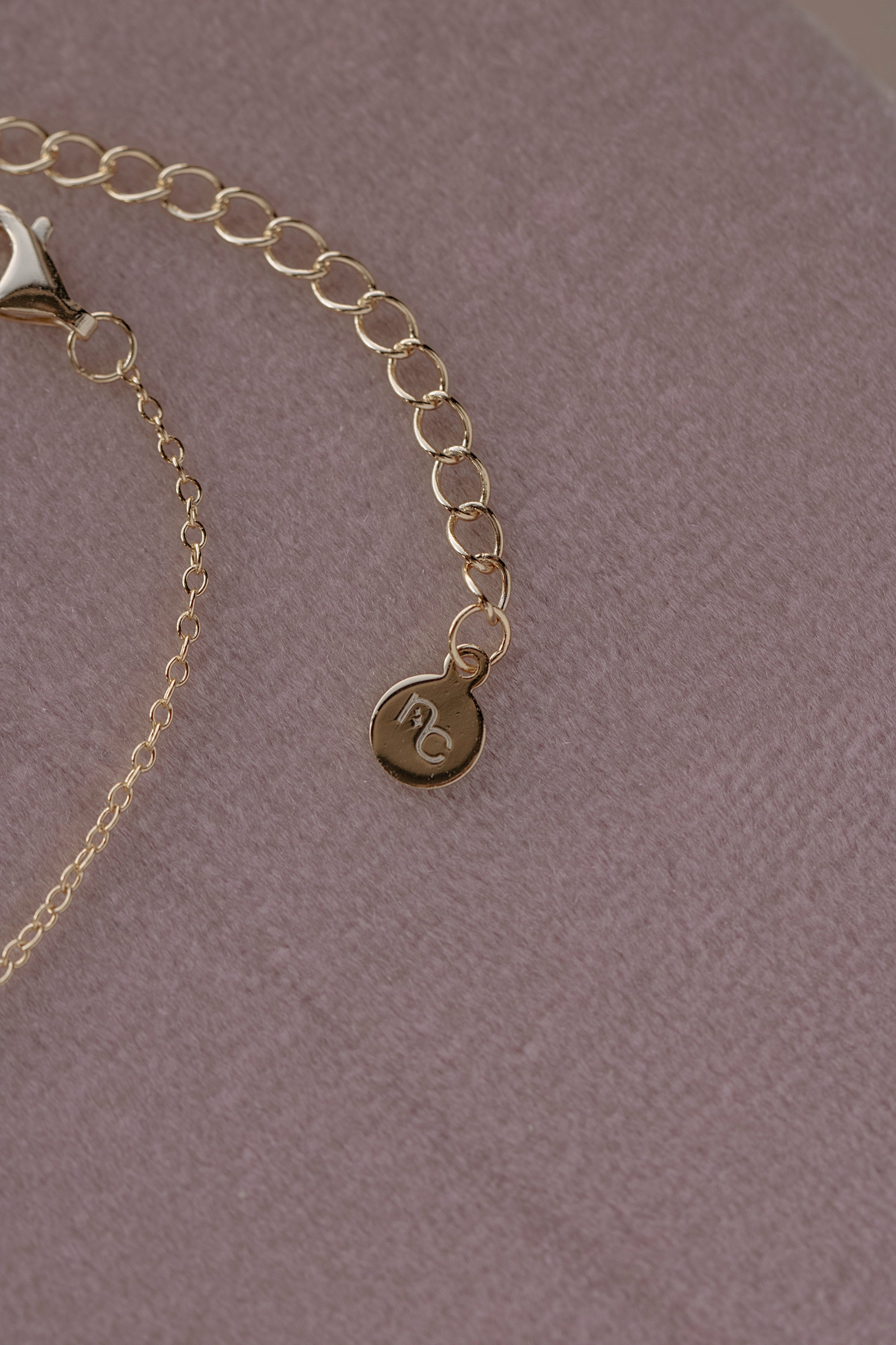 White Topaz Emerald Bracelet